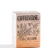 Blossom Naturals coffee packaging showcasing Arabica beans with floral design and tasting notes.