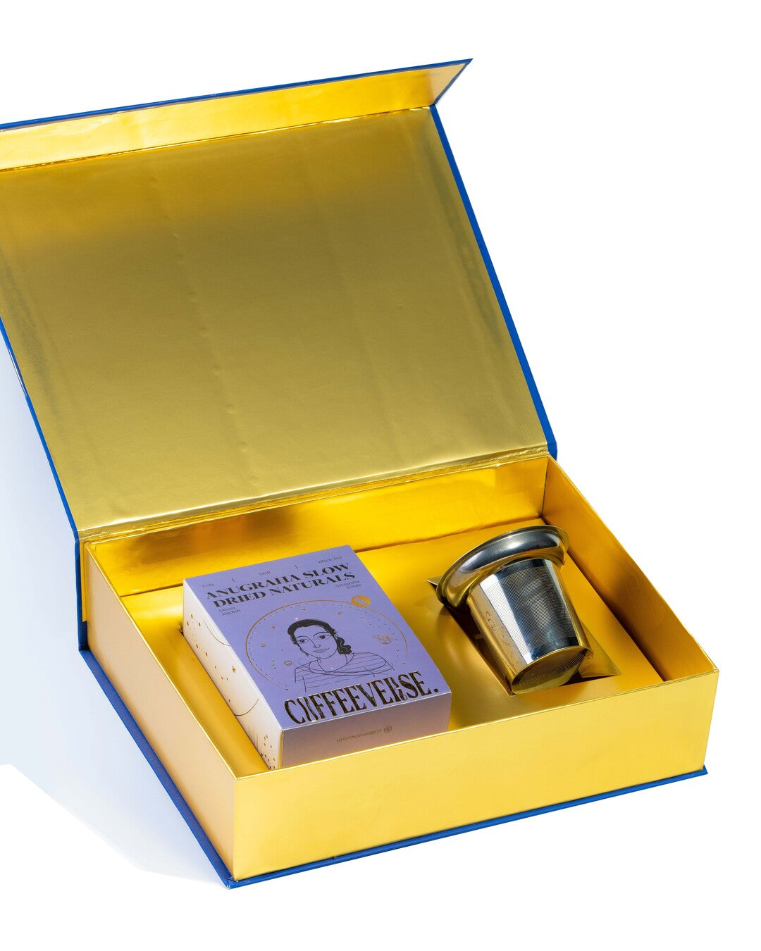Open gold box containing a purple book titled 'Coffee Verse' and a silver cup on a white background