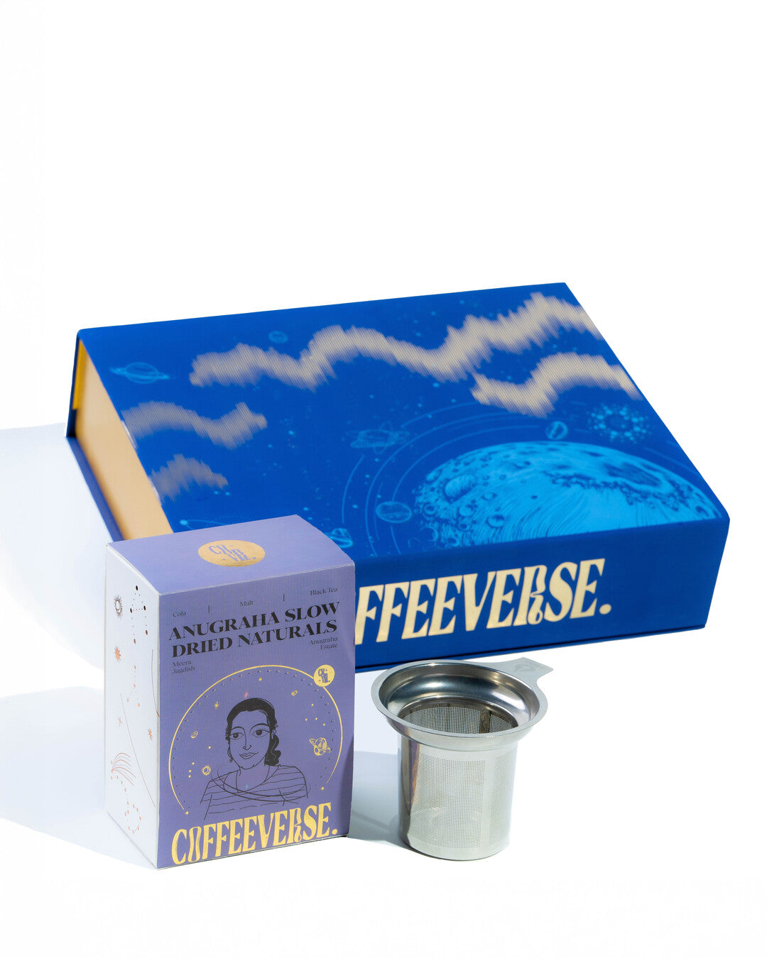 Coffeeverse product set including a blue box, purple packaging, and metal filter on a white background