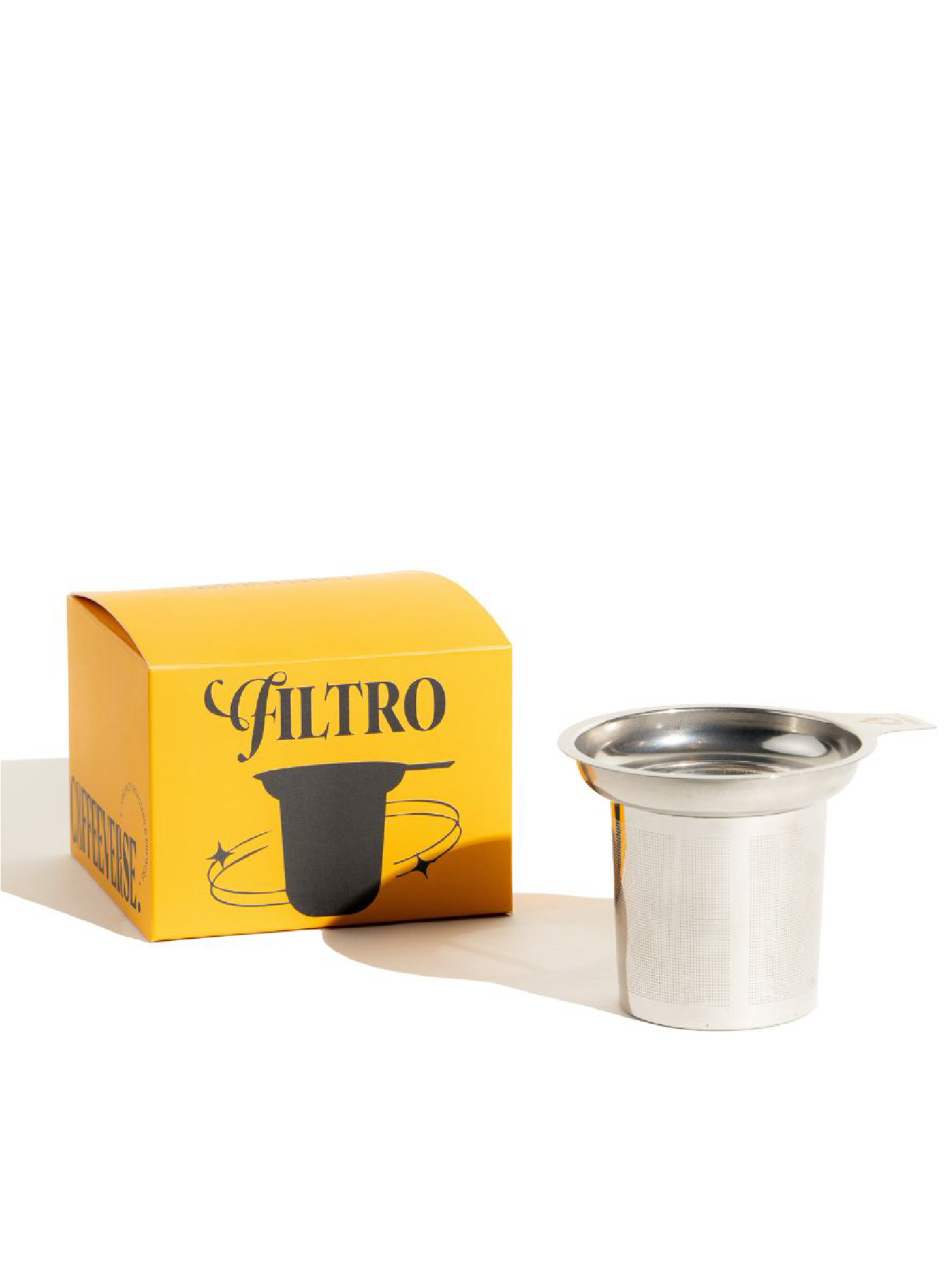 Metal coffee filter with yellow box labeled 'Giltro' on a white background