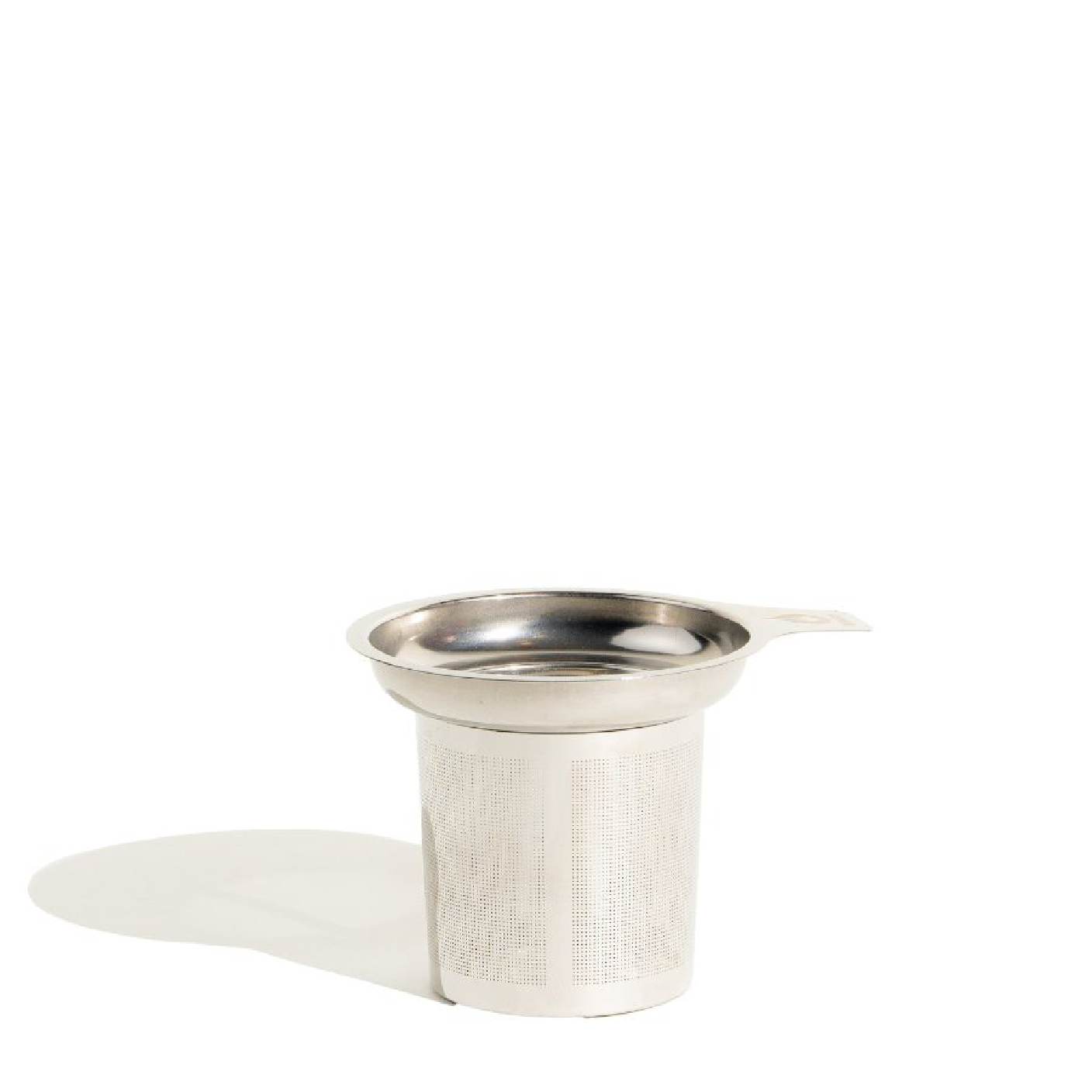 Metallic tea infuser on a white background