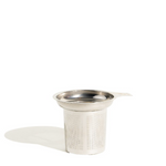 Metallic tea infuser on a white background